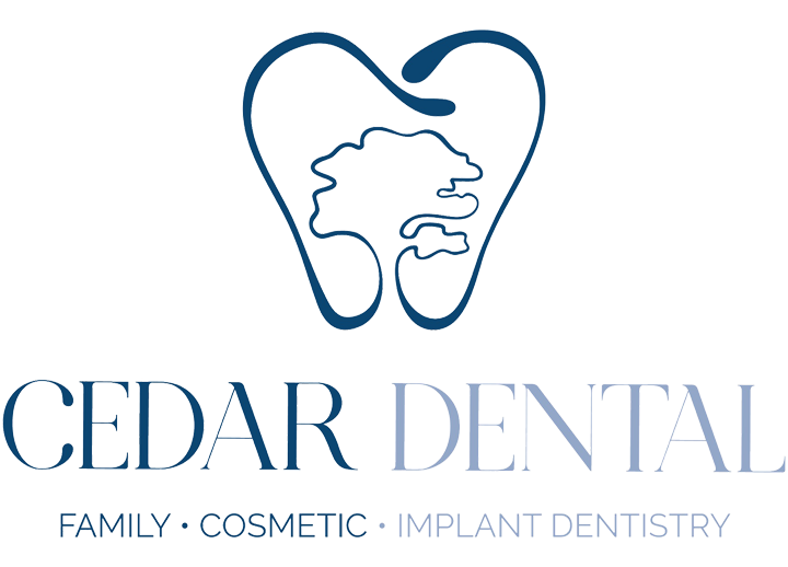 The image displays a logo with the text  CEDAR DENTAL  prominently featured, accompanied by the silhouette of a human profile and a stylized heart shape. The design is modern and professional, suggesting a dental practice specializing in cosmetic dentistry.